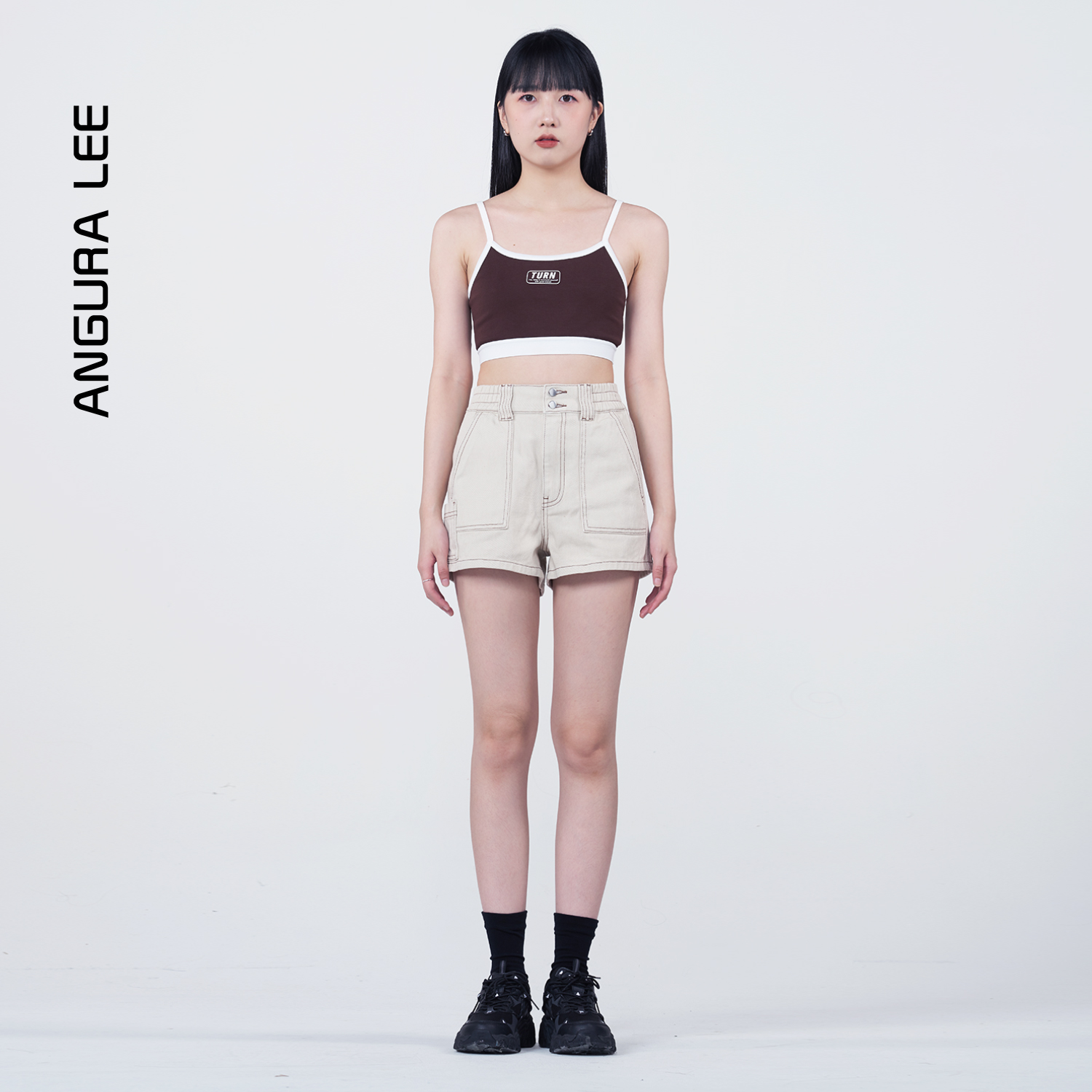 春夏新款經(jīng)典淺杏水洗女裝高腰牛仔短褲